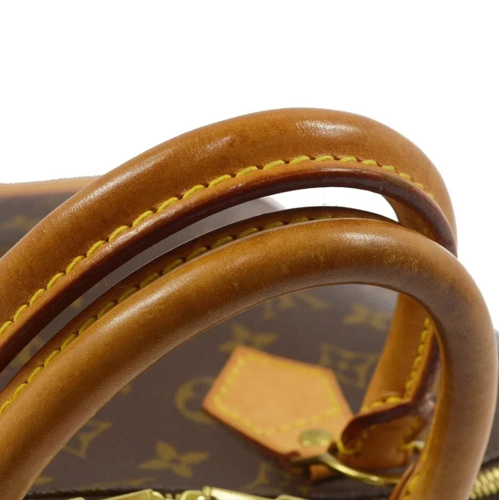 LOUIS VUITTON Alma Monogram Handbag - Picture 6 of 9